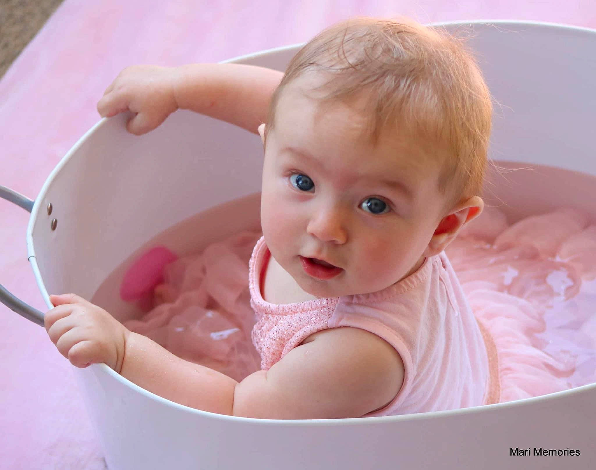 Rosalynn is registered to the contest to win money with this photo: baby, baby_bathing, baby_products, bathing, bathtub, birth, child, person, pink, product, room, skin, toddler, washing