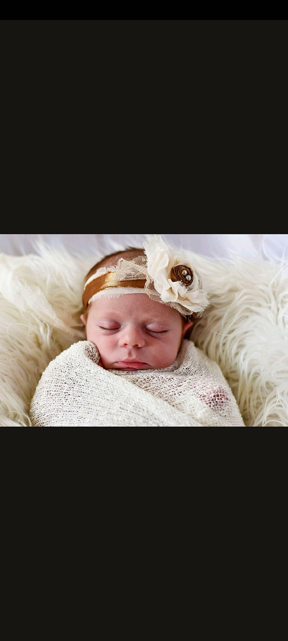 Sage is registered to the contest to win money with this photo: baby, baby_sleeping, baby_toddler_clothing, beanie, cheek, child, collar, comfort, eyelash, fashion_accessory, flash_photography, fur, happy, headwear, linens, person, portrait, portrait_photography, room, sitting