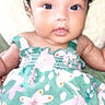 Solar joined the competition — help win amazing prizes! adorable, baby, baby_girl, child, closeup, cute, dress, eyes, face, floral_pattern, hair_bow, indoors, infant, person, portrait, sitting, skin, smile, soft_blanket, young_child