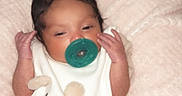 Solar is registered to the contest to win money with this photo: baby, pacifier, bows, blanket, cute, infant, clothing, white, bear, soft, cozy, sleepy, newborn, toddler, resting, indoors, portrait, child, cute_outfit, baby_bib