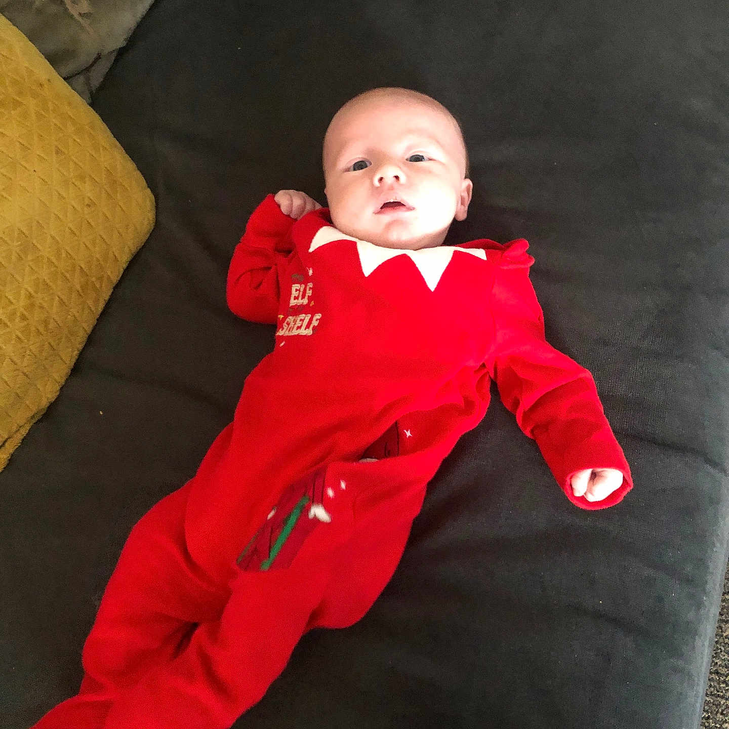 Keegan joined the competition — help win amazing prizes! baby, bed, clothing, coat, couch, cushion, face, formalwear, furniture, head, homedecor, jacket, pajamas, pants, person, photography, portrait, standing, suit, velvet