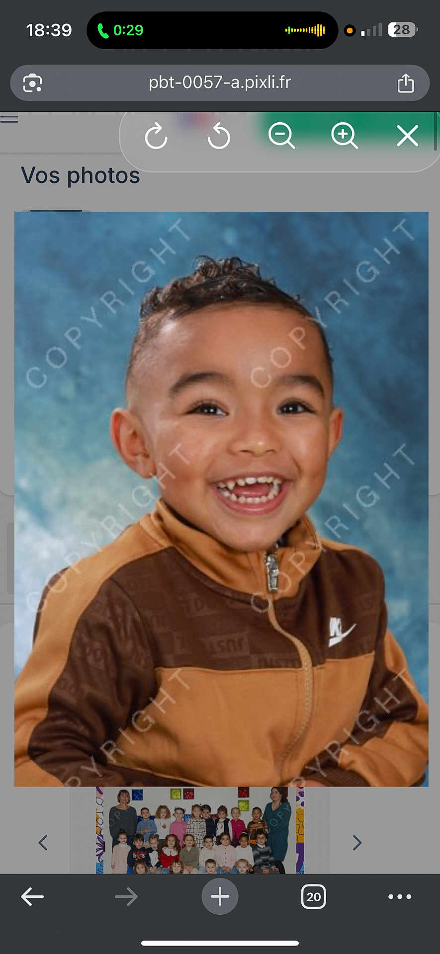 Idris a rejoint le concours — aidez-le/la à gagner de superbes lots ! child, smiling, portrait, happy, face, jacket, nike, brown_clothing, young_child, studio_photo, blue_background, cute, joyful, person, headshot, casual_wear, curly_hair, teeth, closeup, expression