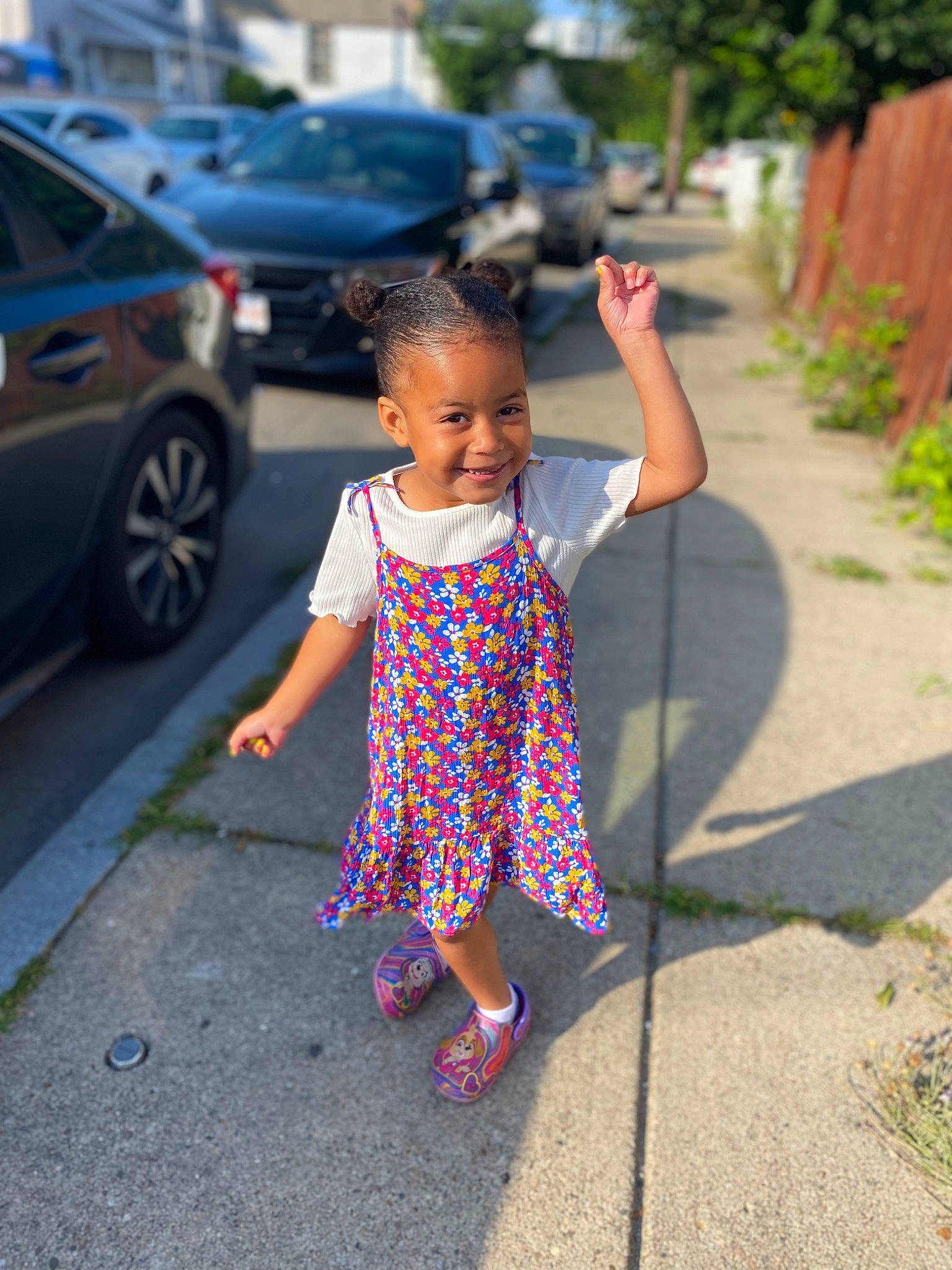 Amiya is registered to the contest to win money with this photo: asphalt, car, electric_blue, fun, grass, happy, joy, leaf, leisure, magenta, person, pink, plant, recreation, road, road_surface, sidewalk, smile, tire, toddler