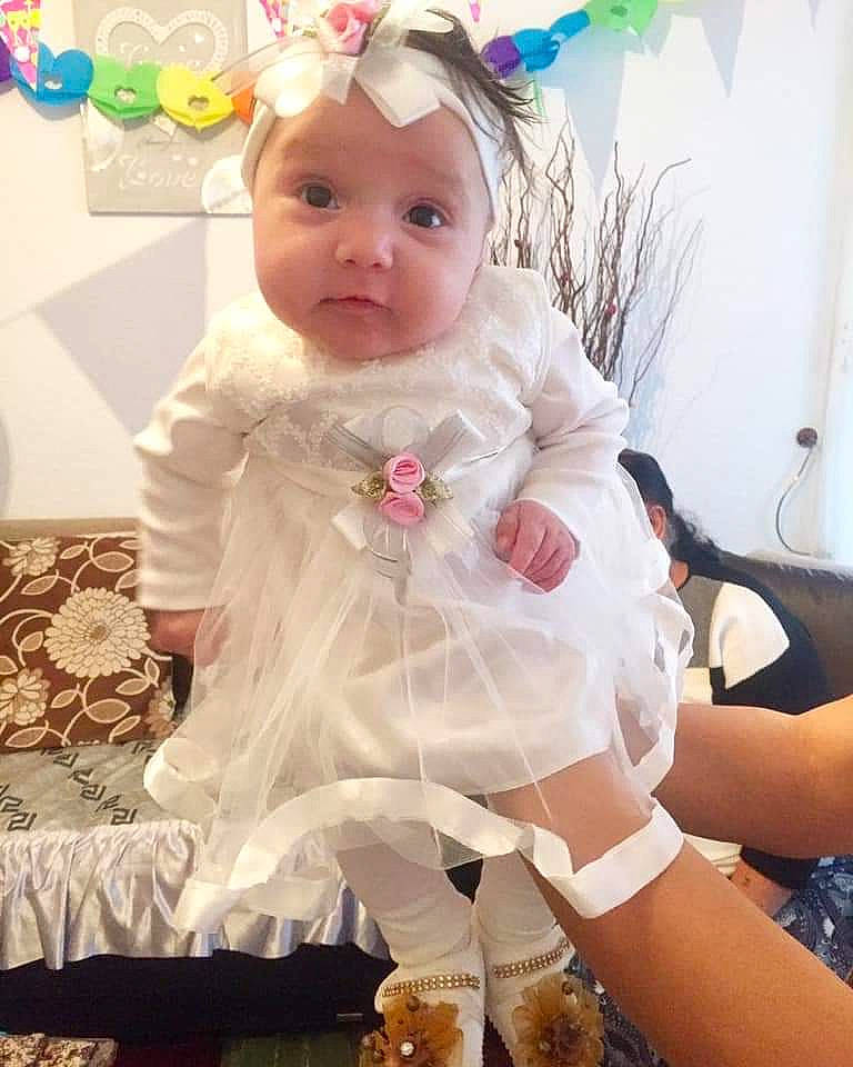 Florida a rejoint le concours — aidez-le/la à gagner de superbes lots ! baby, baby_toddler_clothing, child, costume, dress, head, person, pink, product, smile, toddler, white