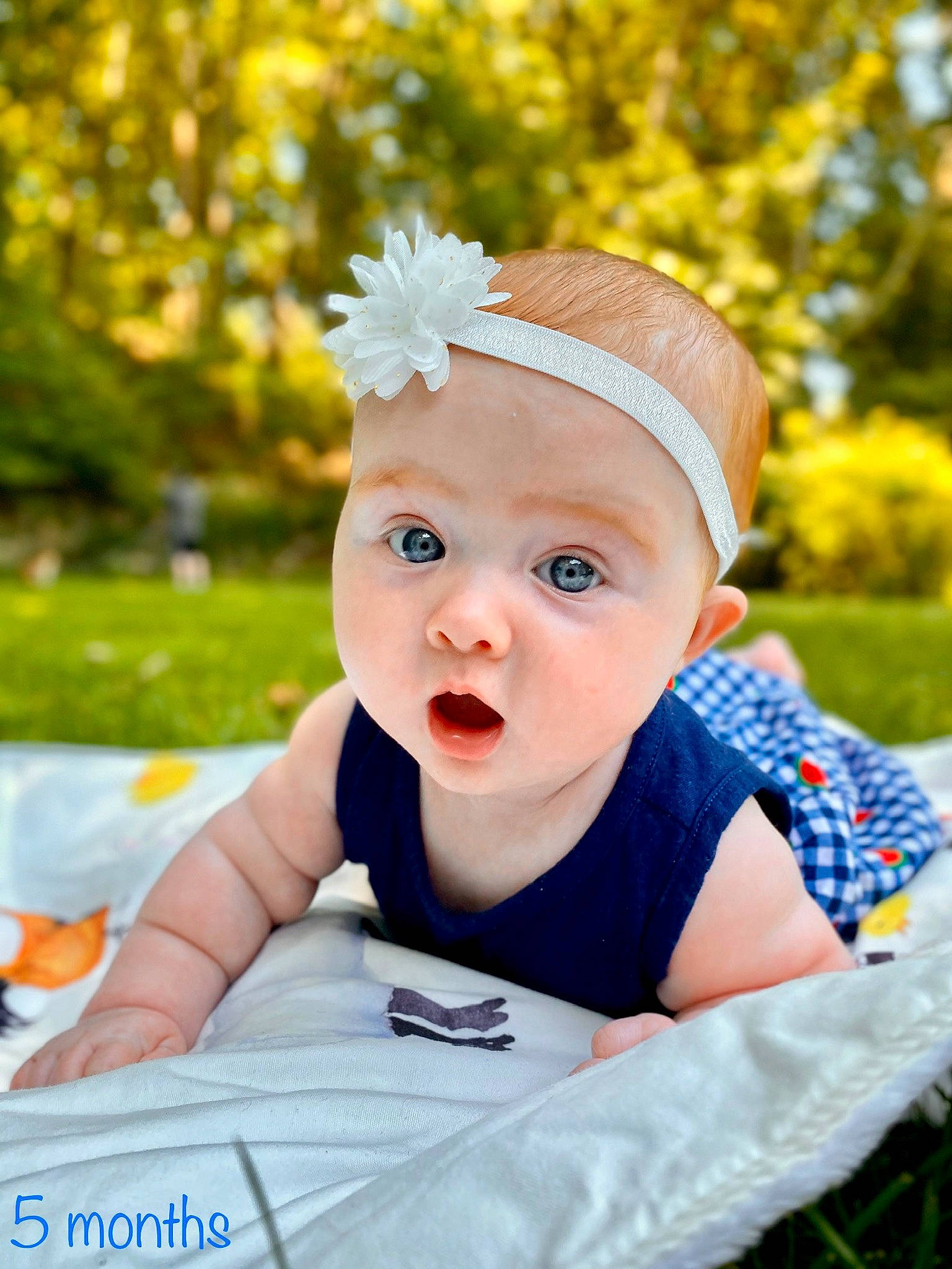 Mary joined the competition — help win amazing prizes! baby, baby_toddler_clothing, cap, child, eye, fashion_accessory, flash_photography, fun, grass, happy, hat, headwear, leisure, pattern, people_in_nature, person, plant, recreation, sitting, surprise