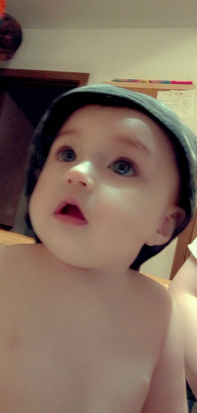 Everly joined the competition — help win amazing prizes! baby, black_hair, cheek, chest, child, chin, close_up, ear, eyebrow, eyelash, forehead, happy, headwear, iris, jaw, lip, mouth, no_expression, nose, person