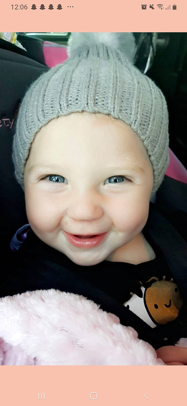 Haleigh joined the competition — help win amazing prizes! baby, beanie, bonnet, cap, cheek, child, chin, eyebrow, face, forehead, head, headgear, headwear, joy, knit_cap, lip, nose, person, pink, skin