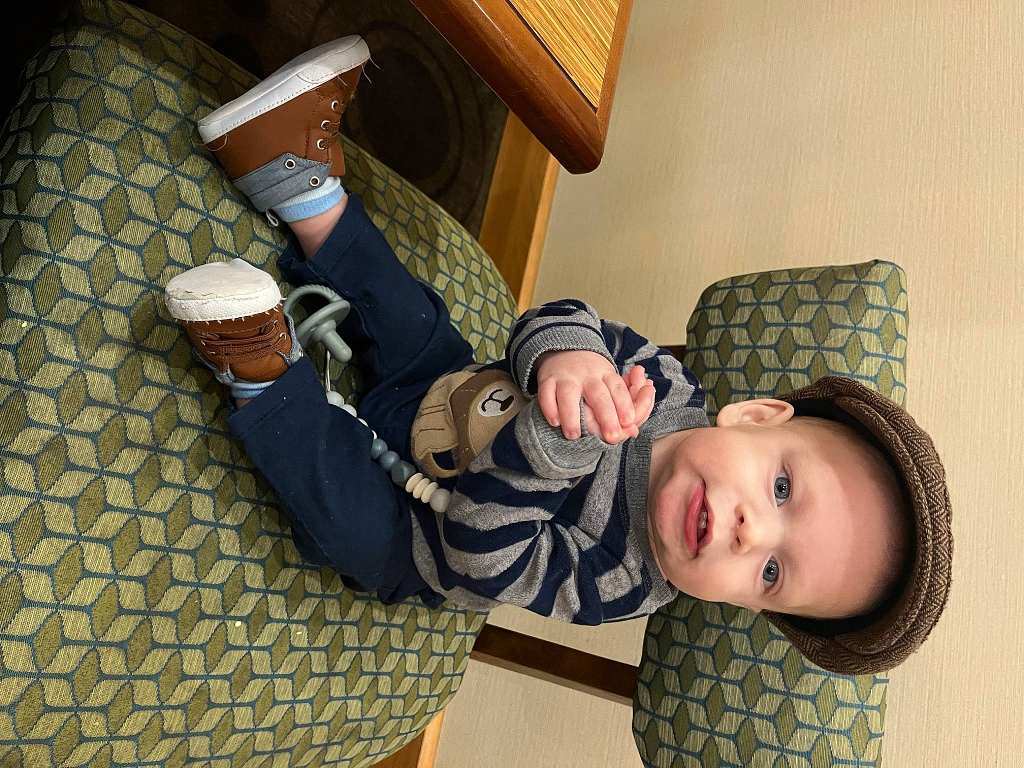 Kip joined the competition — help win amazing prizes! baby, baby_laughing, baby_toddler_clothing, child, comfort, elbow, flooring, fun, happy, hat, headgear, human_leg, pattern, person, room, sitting, smile, toddler, wood