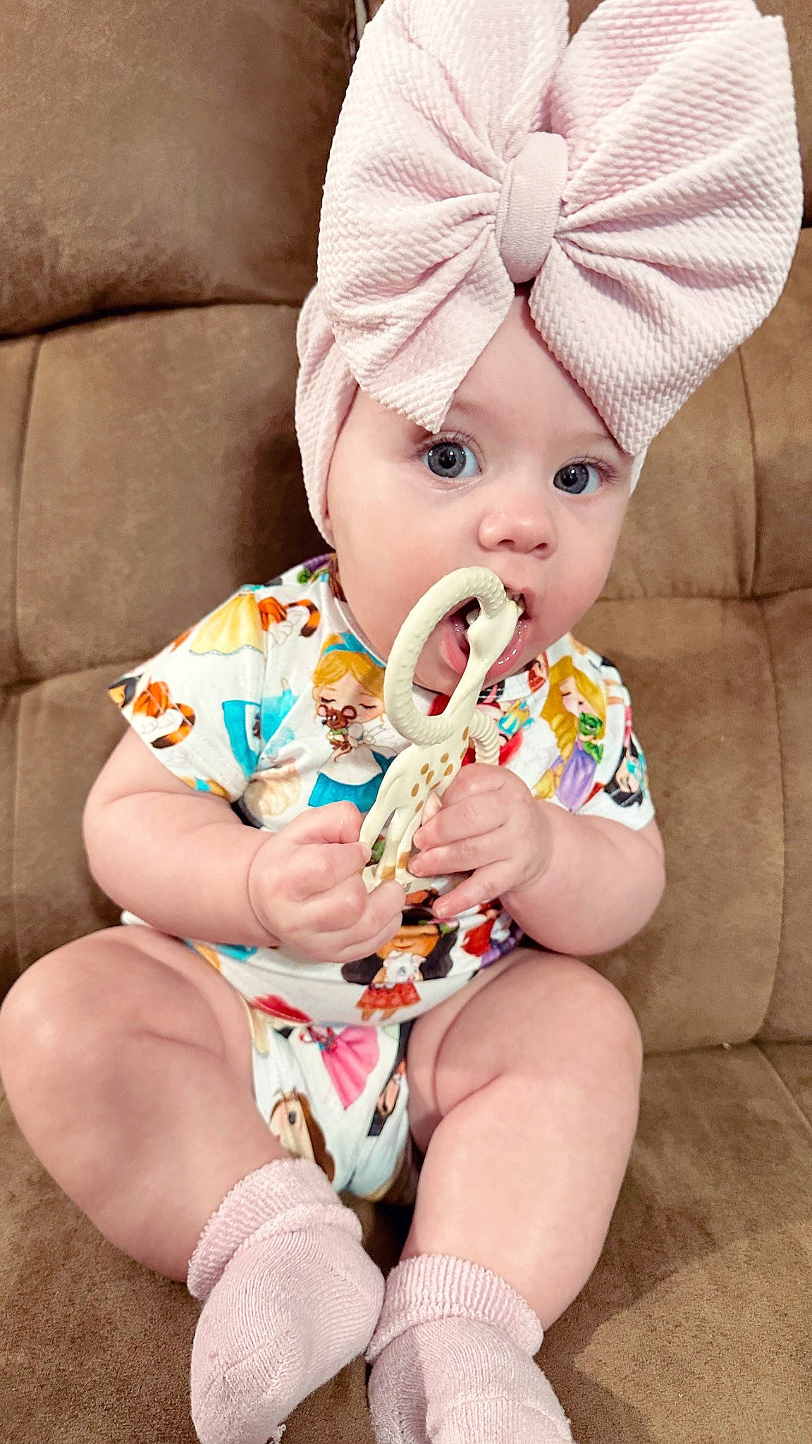 Sutton is registered to the contest to win money with this photo: baby, baby_sleeping, baby_toddler_clothing, cap, cheek, child, comfort, eye, face, happy, hat, headwear, lap, linens, pattern, person, play, sitting, skin, sleeve