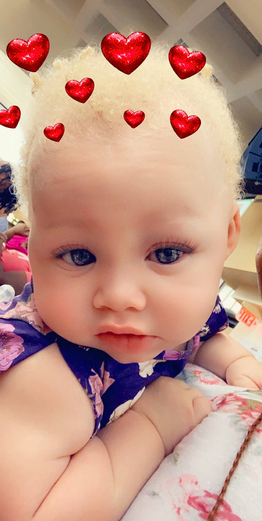 Jalani is registered to the contest to win money with this photo: baby, cheek, child, close_up, ear, eye, face, finger, head, lip, mouth, nail, nose, person, pink, skin, smile, toddler