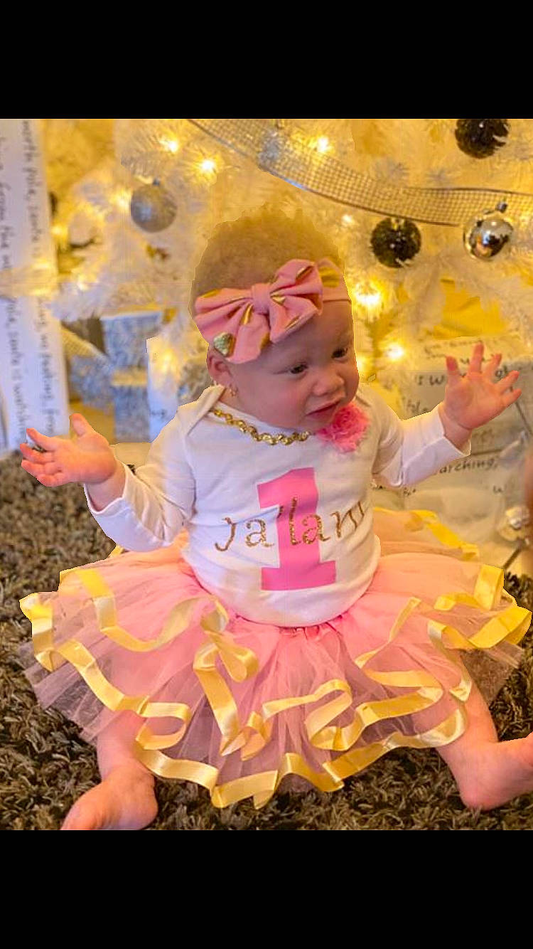 Jalani is registered to the contest to win money with this photo: baby, child, costume, fun, happy, headwear, person, photography, photomontage, pink, play, smile, toddler