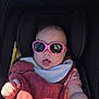 accessory, baby, blanket, car_seat, casual, child, clothing, comfort, cute, expression, fashion, fun, headwear, infant, pink, portrait, seat, shadow, sunglasses, sunlight