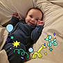 Blake joined the competition — help win amazing prizes! baby, infant, smile, dimples, pajamas, blanket, bedding, pillow, portrait, indoor, sticker_overlay, balloon, balloon_animal, celebration, cute, face, hand, eyes, cozy, smiling