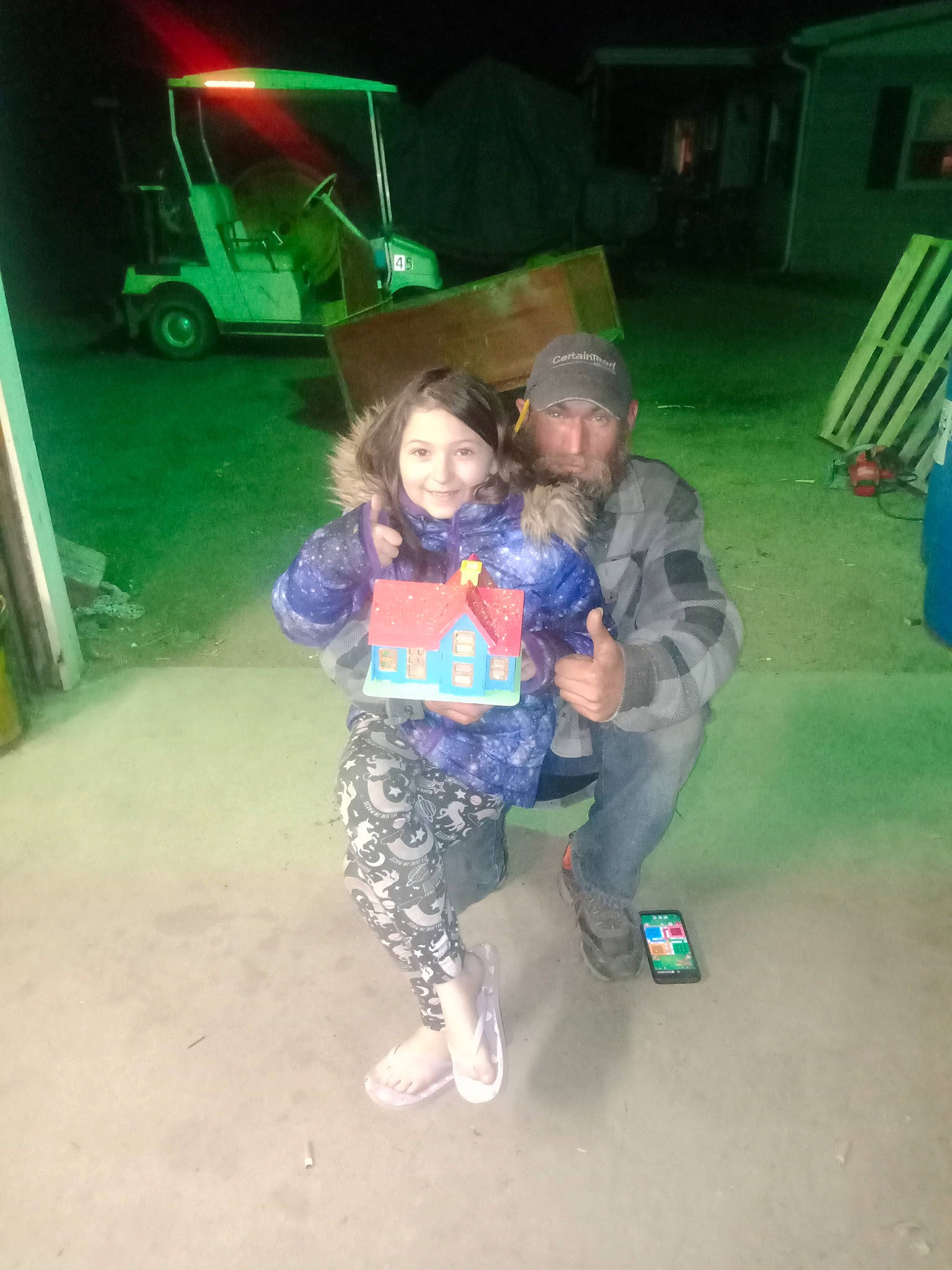 Angelina is registered to the contest to win money with this photo: automotive_lighting, automotive_tire, chair, cool, electric_blue, event, fun, grass, headwear, joy, leisure, light, midnight, motor_vehicle, night, person, recreation, shorts, sitting, smile