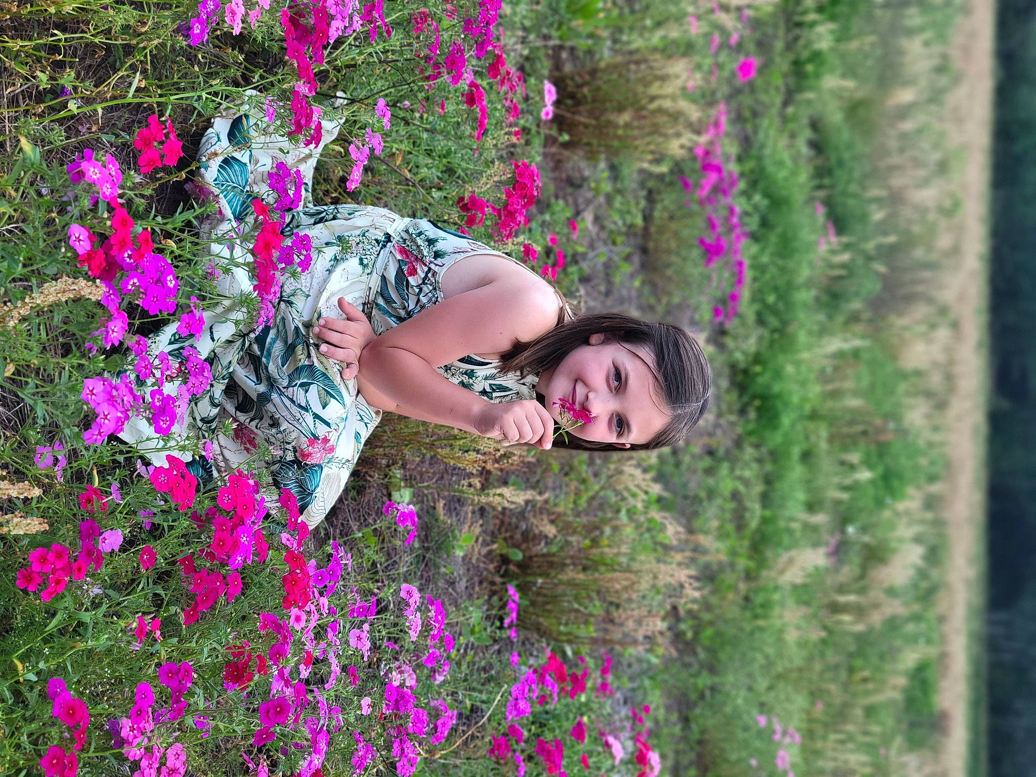 Piper joined the competition — help win amazing prizes! botany, eye, flower, flowering_plant, grass, green, groundcover, happy, herbaceous_plant, joy, meadow, natural_environment, people_in_nature, person, petal, pink, plant, purple, shrub, summer