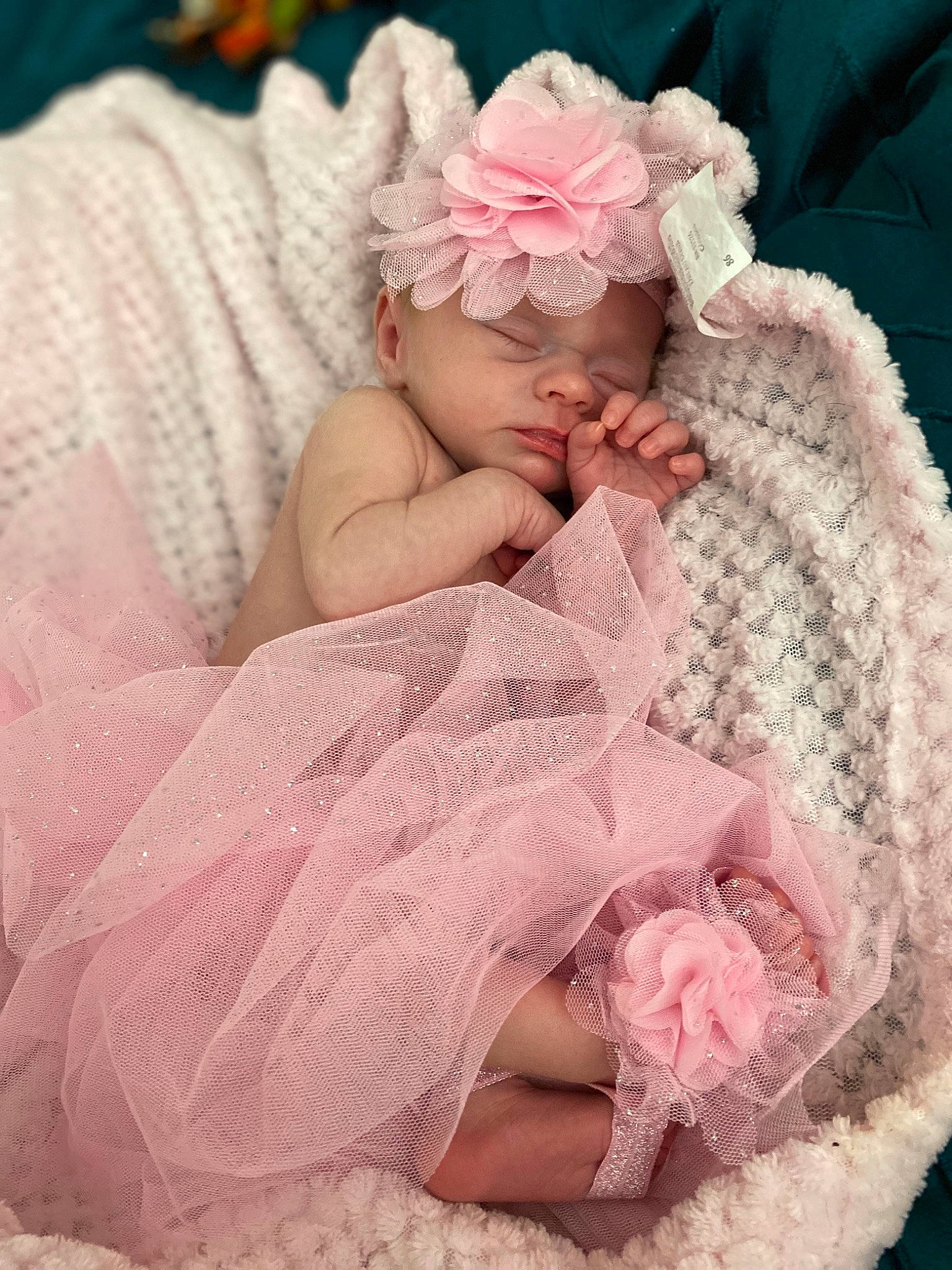 Kaya joined the competition — help win amazing prizes! baby, baby_sleeping, baby_toddler_clothing, bonnet, costume_accessory, craft, creative_arts, embellishment, hair_accessory, headband, headgear, headpiece, headwear, knitting, lace, peach, person, pink, textile, thread