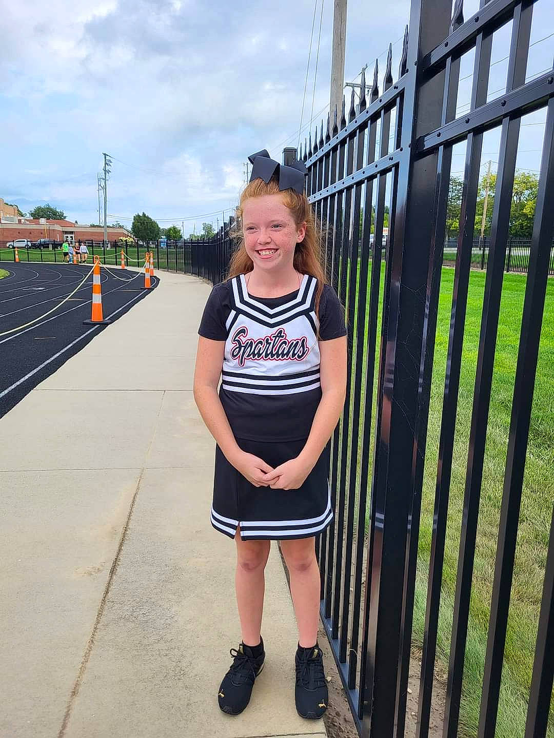 Nevaeh joined the competition — help win amazing prizes! asphalt, electric_blue, eye, eyewear, fence, fun, grass, handrail, human_leg, joy, knee, leg, leisure, metal, pattern, person, recreation, sky, sleeve, t_shirt