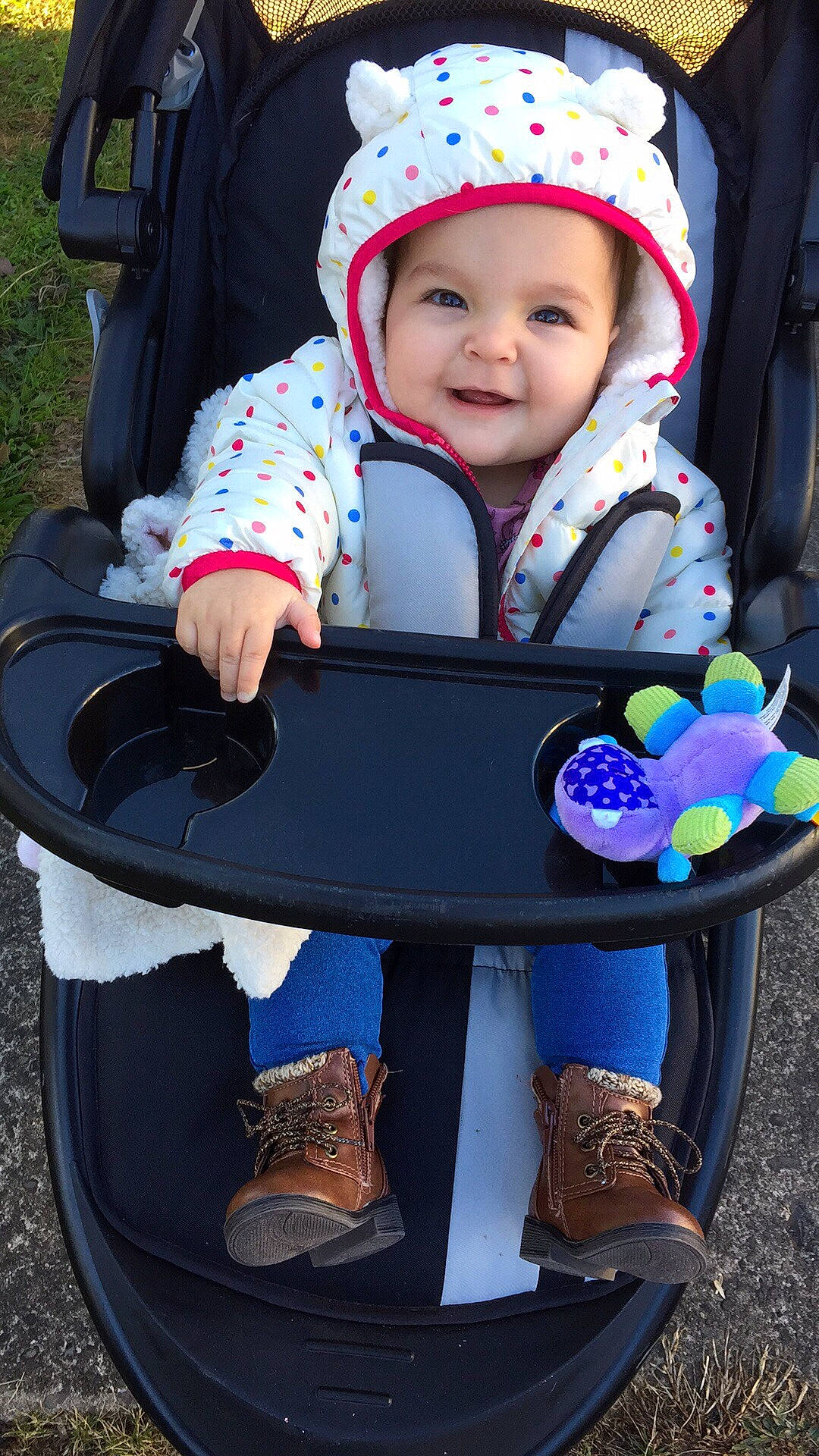 Briella is registered to the contest to win money with this photo: baby, baby_carriage, baby_products, child, joy, person, play, product, sitting, smile, toddler