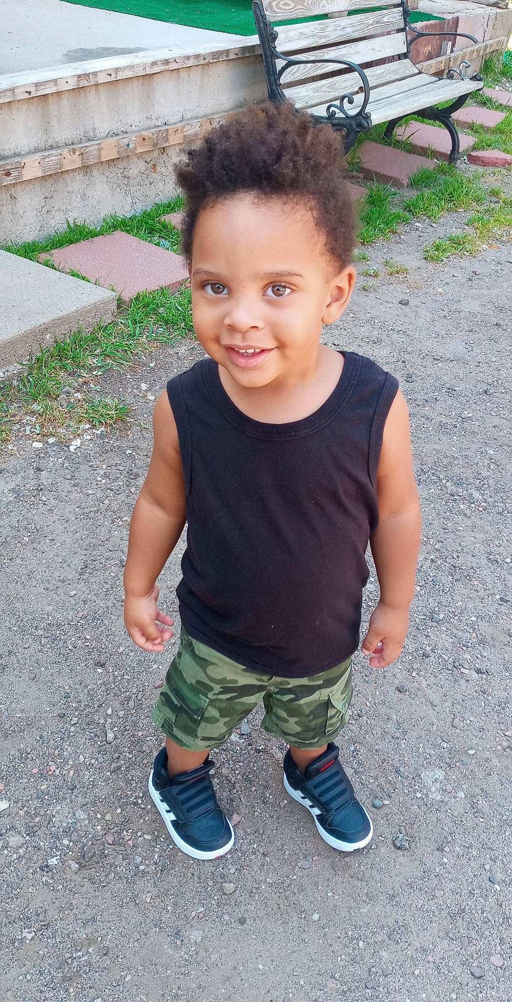 Tahj joined the competition — help win amazing prizes! asphalt, baby_toddler_clothing, child, chin, eye, grass, hair, hairstyle, happy, head, human_body, joy, pattern, person, road_surface, sandal, shorts, sleeve, smile, t_shirt