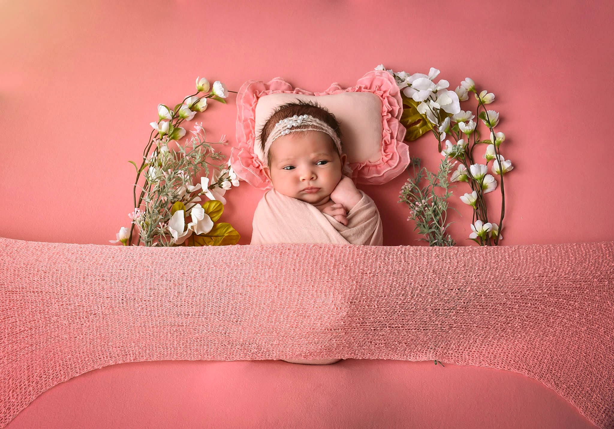 Evaluna is registered to the contest to win money with this photo: arm, baby, comfort, cut_flowers, event, flash_photography, flower, flower_arranging, hand, happy, headband, headpiece, headwear, magenta, person, petal, pink, plant, rose, textile