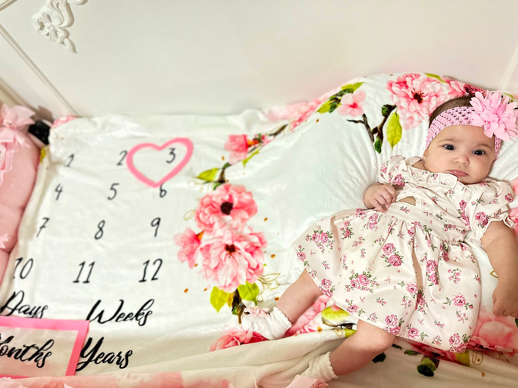 Evaluna joined the competition — help win amazing prizes! baby_toddler_clothing, bedding, child, cut_flowers, fashion_accessory, flower, flower_arranging, font, happy, headwear, linens, magenta, pattern, peach, person, petal, pink, plant, sleeve, t_shirt