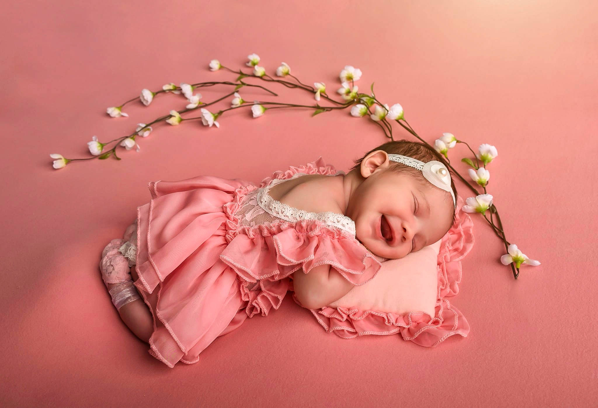 Evaluna is registered to the contest to win money with this photo: baby, baby_toddler_clothing, child, dress, embellishment, fashion_accessory, flash_photography, hair_accessory, hand, happy, headband, headgear, headpiece, jewellery, person, pink, plant, toddler, twig, wood