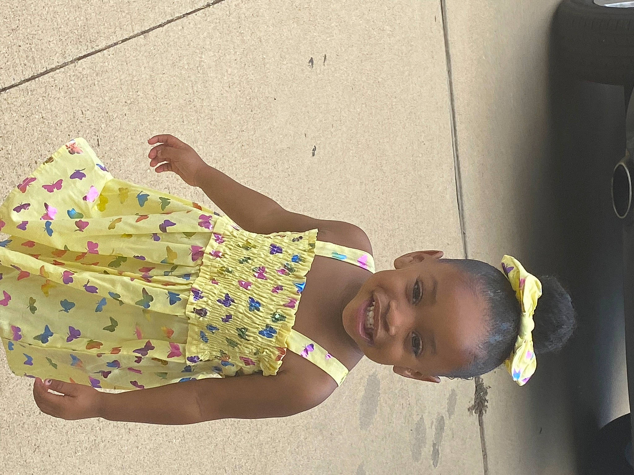 Arielle joined the competition — help win amazing prizes! child, door, dress, elbow, eyewear, fun, glasses, hand, happy, human_leg, joint, joy, leisure, magenta, pattern, person, smile, sunglasses, t_shirt, thigh