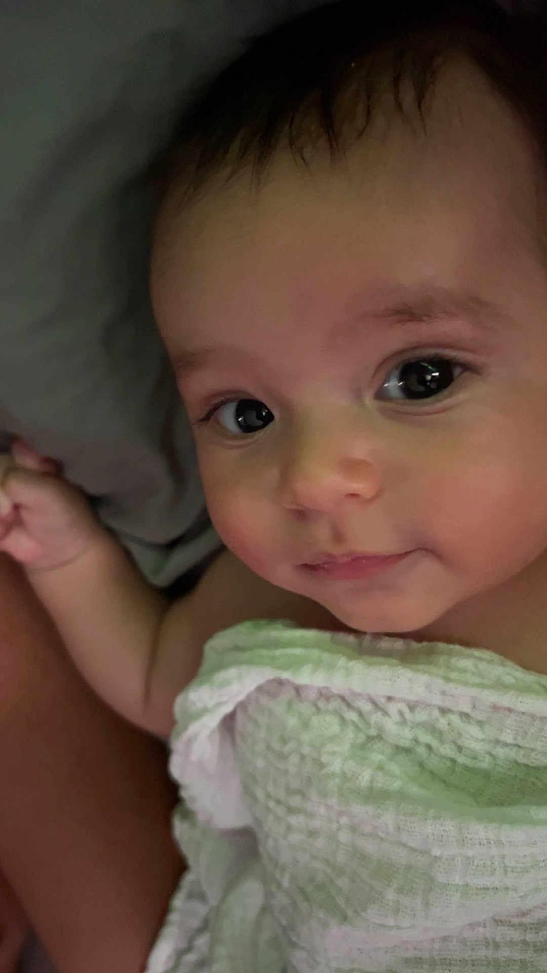 Aaron participe au concours pour gagner de l'argent avec cette photo : baby, child, face, eyes, towel, skin, expression, cute, infant, portrait, closeup, looking, hand, soft, newborn, person, indoors, young, wrapped, adorable