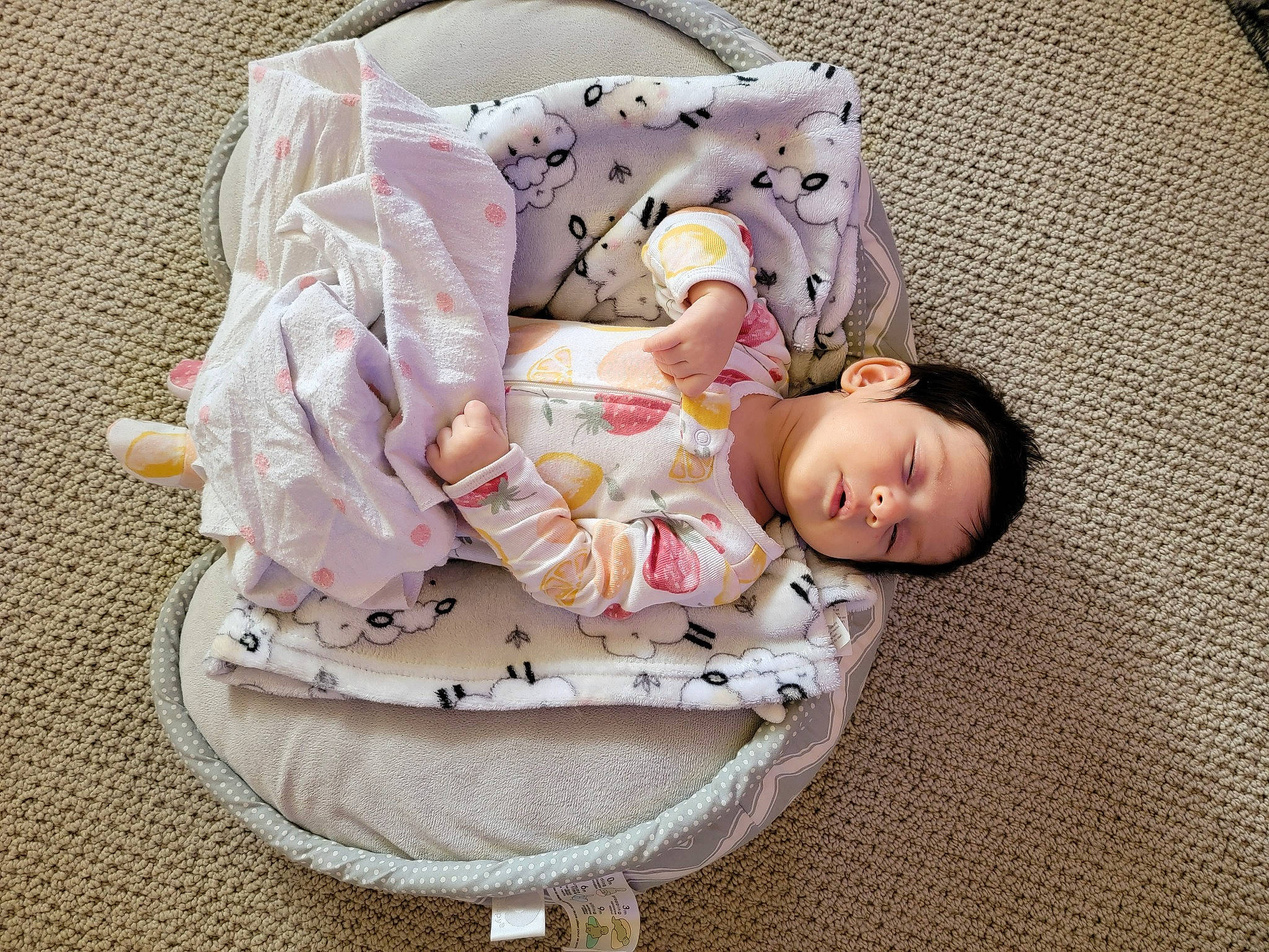 Celeste is registered to the contest to win money with this photo: baby, baby_products, baby_sleeping, baby_toddler_clothing, bedding, child, comfort, costume_hat, fashion_accessory, hair_accessory, hat, headgear, linens, nap, pattern, person, sitting, sleep, sleeve, toddler