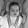 baby, sleeping, car_seat, harness, blanket, infant, peaceful, monochrome, child, face, clothing, closeup, resting, cute, portrait, indoor, baby_girl, soft, young, toddler