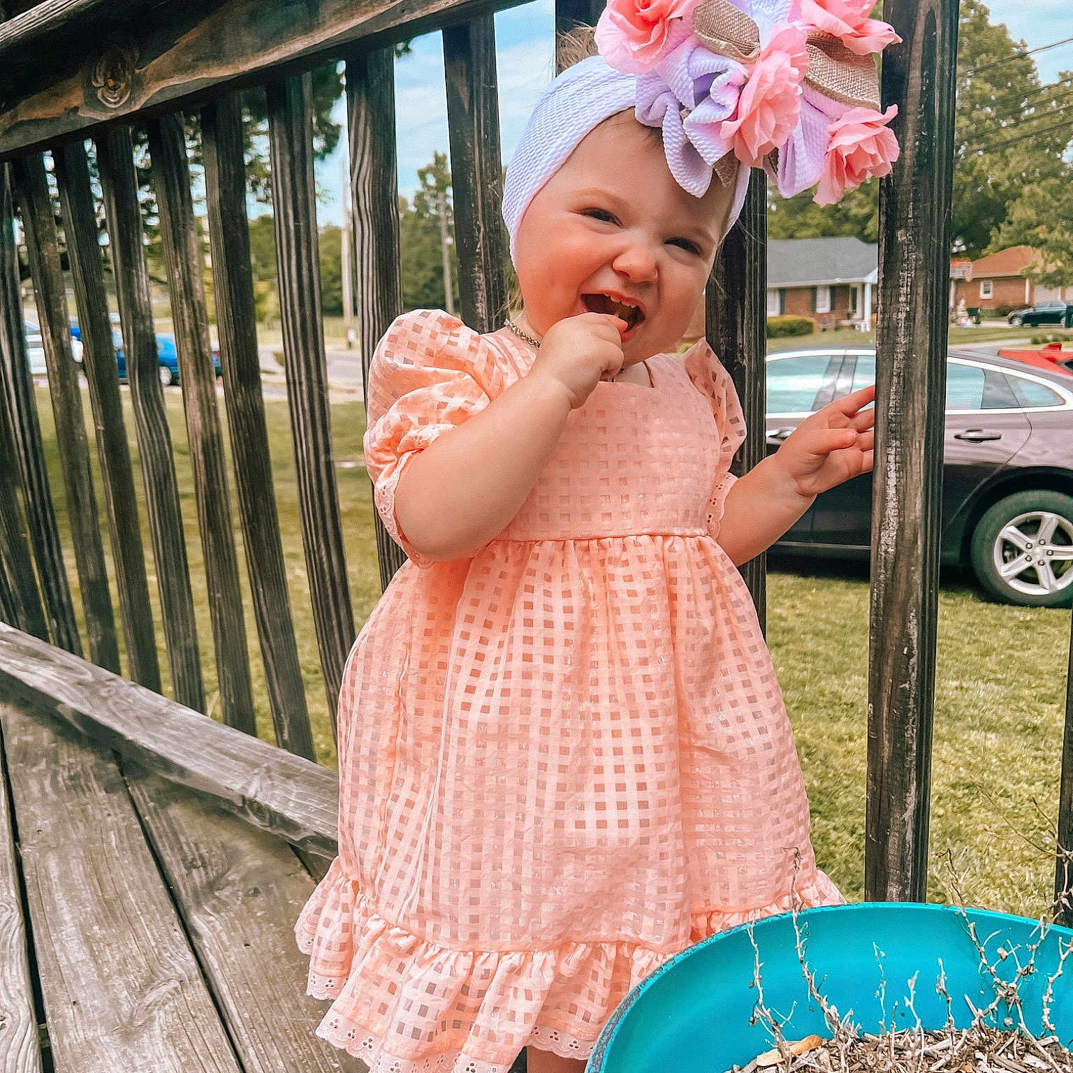 Laynee is registered to the contest to win money with this photo: baby, baby_toddler_clothing, dress, fun, grass, happy, hat, leaf, leisure, people_in_nature, pink, plant, smile, summer, sun_hat, tire, toddler, tree, wheel, wood