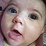 Olga participe au concours pour gagner de l'argent avec cette photo : baby, infant, close_up, face, eyes, eyelashes, mouth, nose, cheek, skin, blanket, pink, onesie, soft_texture, portrait, gazing, cute, expression, drool, newborn