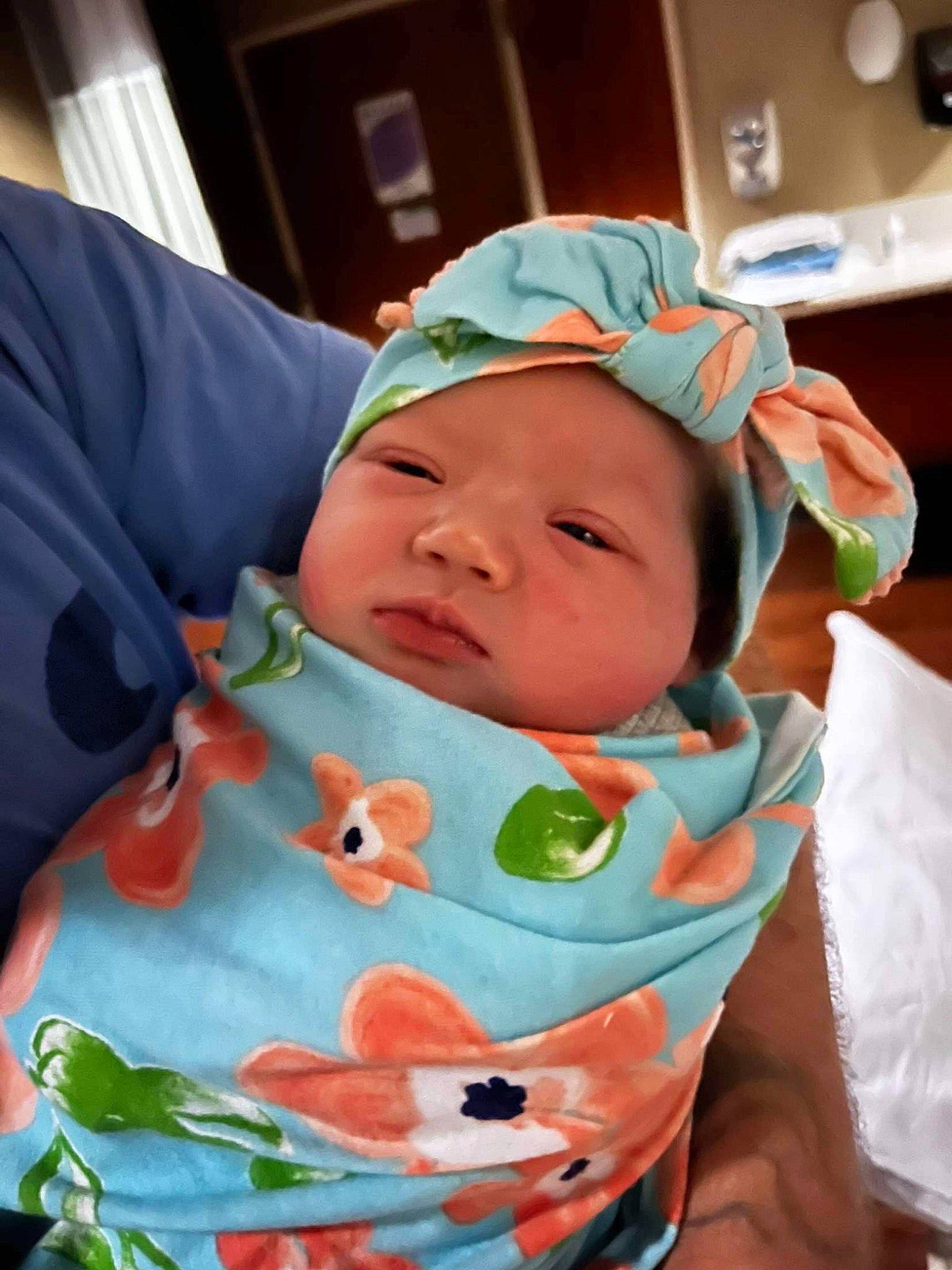 Sophia is registered to the contest to win money with this photo: baby, baby_products, baby_safety, baby_toddler_clothing, bib, cap, cheek, child, comfort, grass, happy, hat, headwear, mouth, peach, person, personal_protective_equipment, room, service, skin