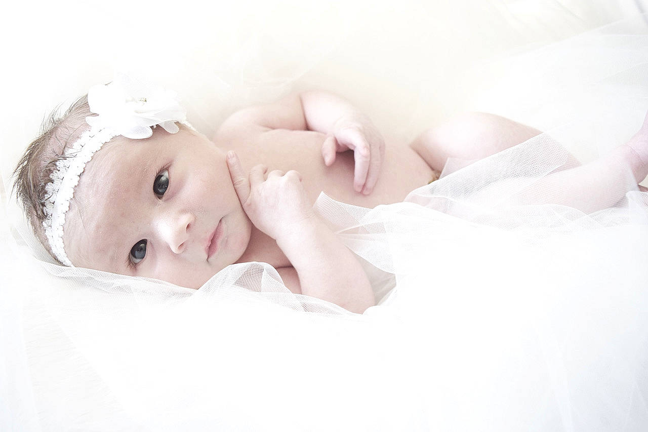 Lana is registered to the contest to win money with this photo: baby, beauty, child, ear, eye, eyelash, face, hair_accessory, head, headpiece, lip, nose, person, photography, pink, portrait_photography, skin, toddler, white