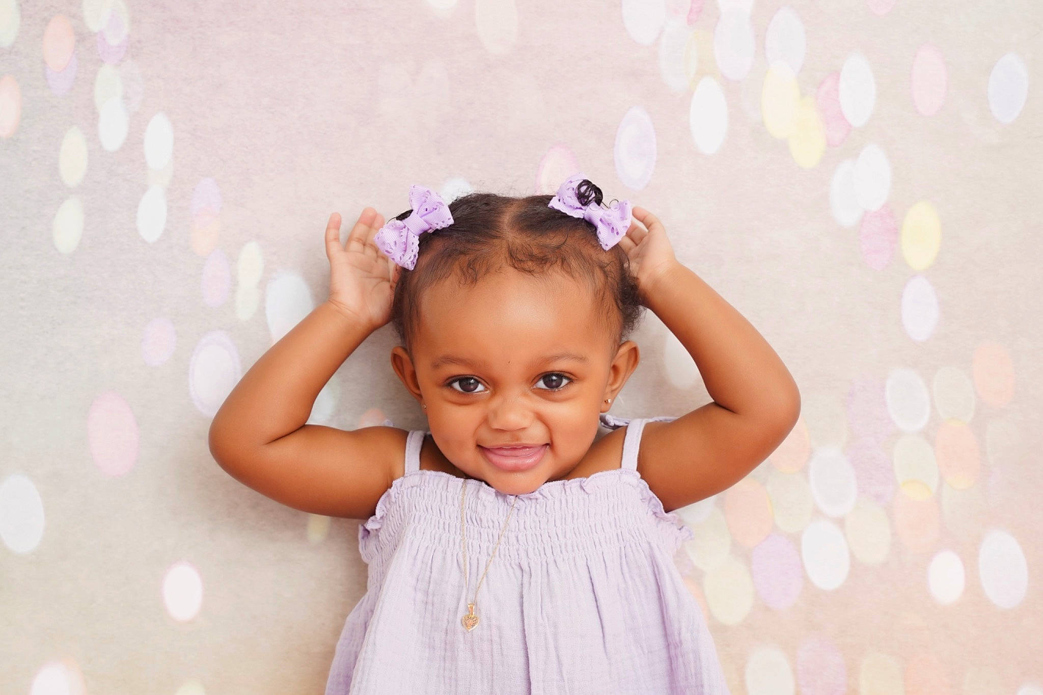 Jayda joined the competition — help win amazing prizes! arm, baby_toddler_clothing, cheek, dress, ear, eye, eyelash, face, flash_photography, hair, hand, happy, head, joy, lip, neck, person, purple, shoulder, skin