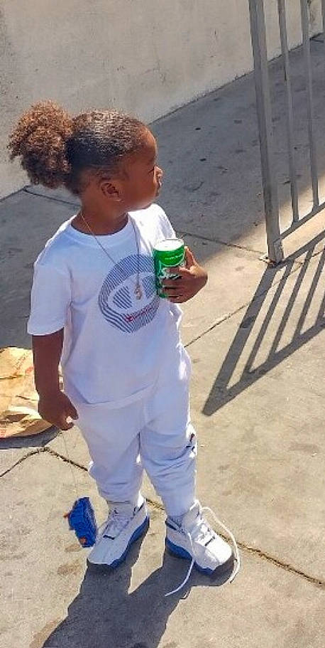 Legend joined the competition — help win amazing prizes! bottle, child, competition_event, drink, drinking, fun, hairstyle, human_leg, leisure, person, plastic_bottle, play, recreation, shadow, soil, sportswear, sweatpant, t_shirt, toddler, walking