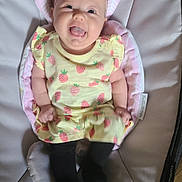 Felicity is registered to the contest to win money with this photo: baby, bed, bonnet, clothing, cradle, crib, dress, face, furniture, happy, hat, head, infantbed, laughing, newborn, pants, person, photography, portrait, smile