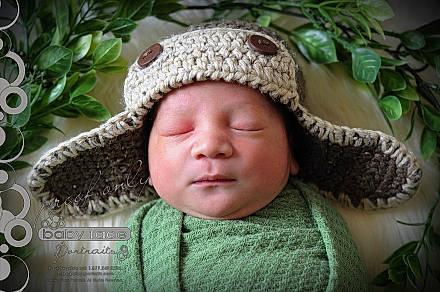 Gio is registered to the contest to win money with this photo: baby, baby_sleeping, baby_toddler_clothing, beanie, cap, cheek, child, comfort, crochet, fashion_accessory, grass, green, happy, headgear, headwear, knit_cap, linens, pattern, person, toddler
