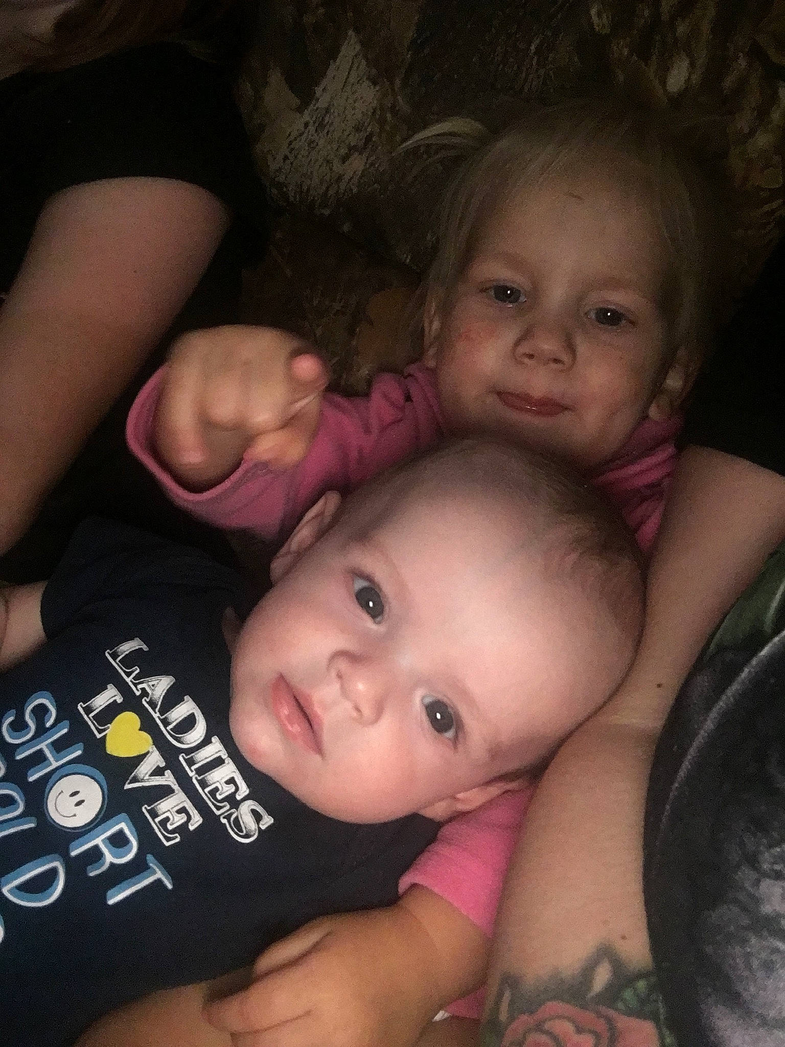 Blake is registered to the contest to win money with this photo: baby, cheek, child, electronic_device, eye, face, fun, hand, happy, head, human, iris, leg, lip, nose, people, person, sibling, skin, smile