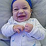 Marcus joined the competition — help win amazing prizes! baby, smiling, blue_hat, dinosaur_pajamas, infant, cute, hands, lying_down, happy, child, soft_surface, cozy, playful, portrait, headwear, clothing, person, closeup, cheerful, baby_girl_or_boy