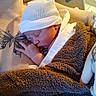 newborn, baby, sleeping, hat, towel, tattoo, butterfly_tattoo, heart_tattoo, arm, hand, skin, hospital, iv_drip, closeup, rest, peaceful, person, human, infant, parent