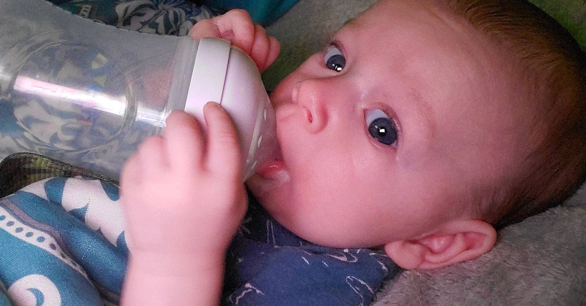 Wesley is registered to the contest to win money with this photo: baby, baby_bottle, baby_products, baby_toddler_clothing, cheek, child, drinking, drinkware, eyebrow, eyelash, hand, lip, milk, nail, organ, person, plastic_bottle, product, skin, taste