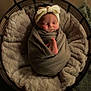 Rowan is registered to the contest to win money with this photo: newborn, baby, sleeping, swaddled, blanket, headband, bow, foot, basket, plush, soft, cozy, portrait, infant, cute, resting, indoors, warm, child, peaceful