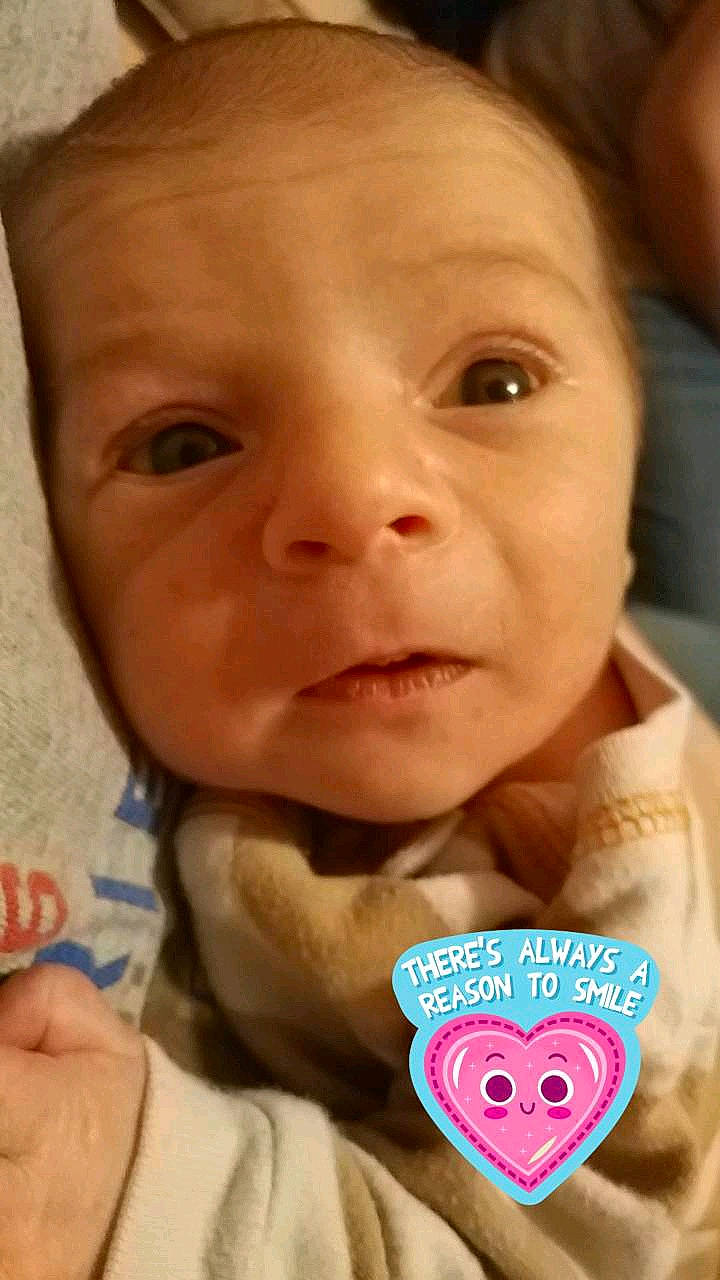 Emmett is registered to the contest to win money with this photo: cheek, child, chin, ear, eye, eyebrow, face, finger, forehead, head, infant, iris, lip, nose, person, product, skin, smile, toddler