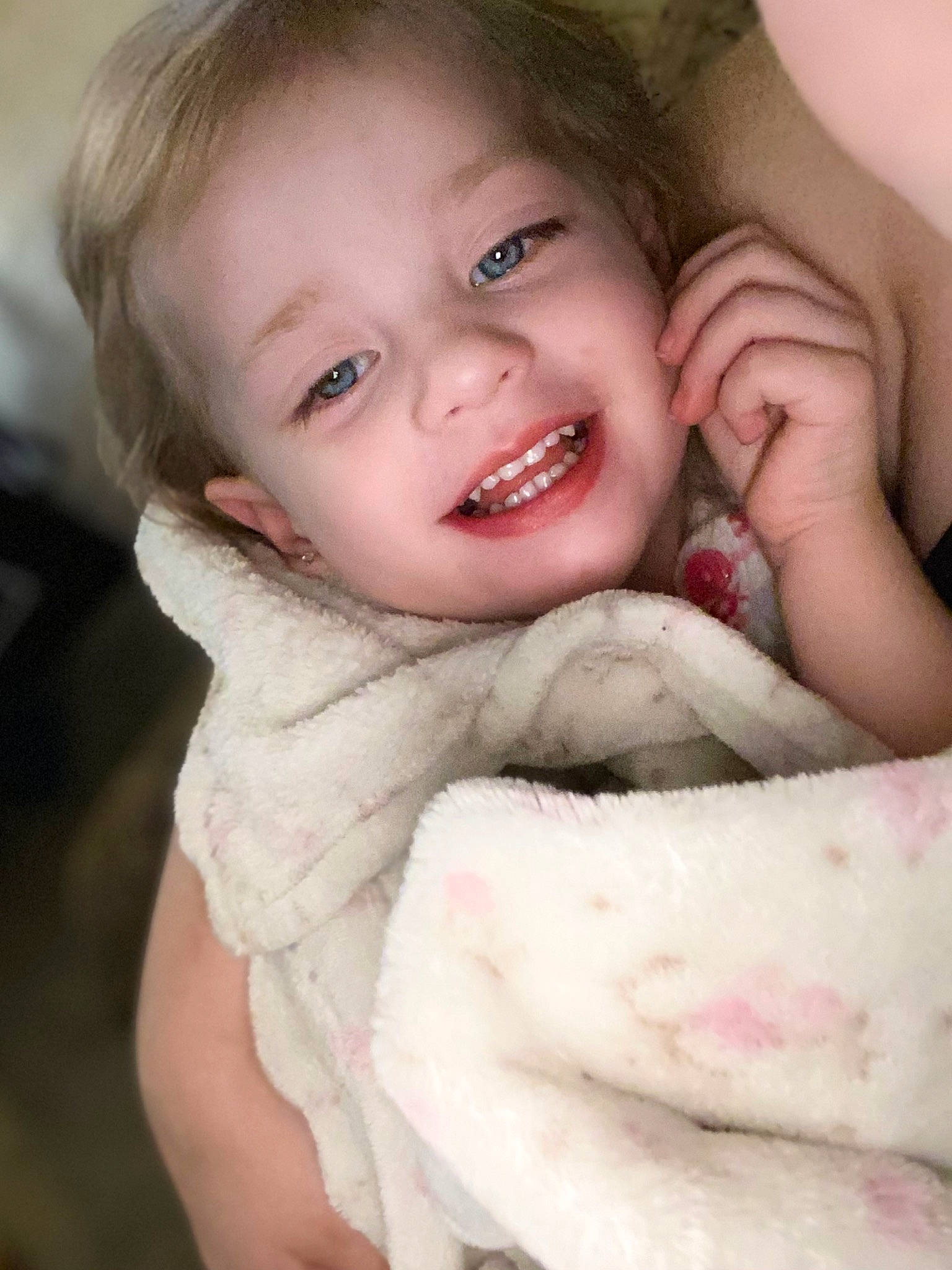 Everleigh is registered to the contest to win money with this photo: baby, baby_toddler_clothing, cheek, comfort, eye, eyelash, finger, flash_photography, gesture, happy, head, human_body, iris, jaw, lip, nose, person, skin, smile, toddler