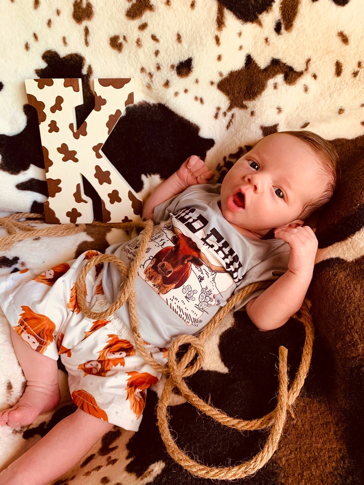Keagan is registered to the contest to win money with this photo: baby, baby_toddler_clothing, child, doll, fashion_accessory, fawn, font, fur, happy, knit_cap, linens, pattern, peach, people_in_nature, person, sleeve, t_shirt, textile, toddler, toy