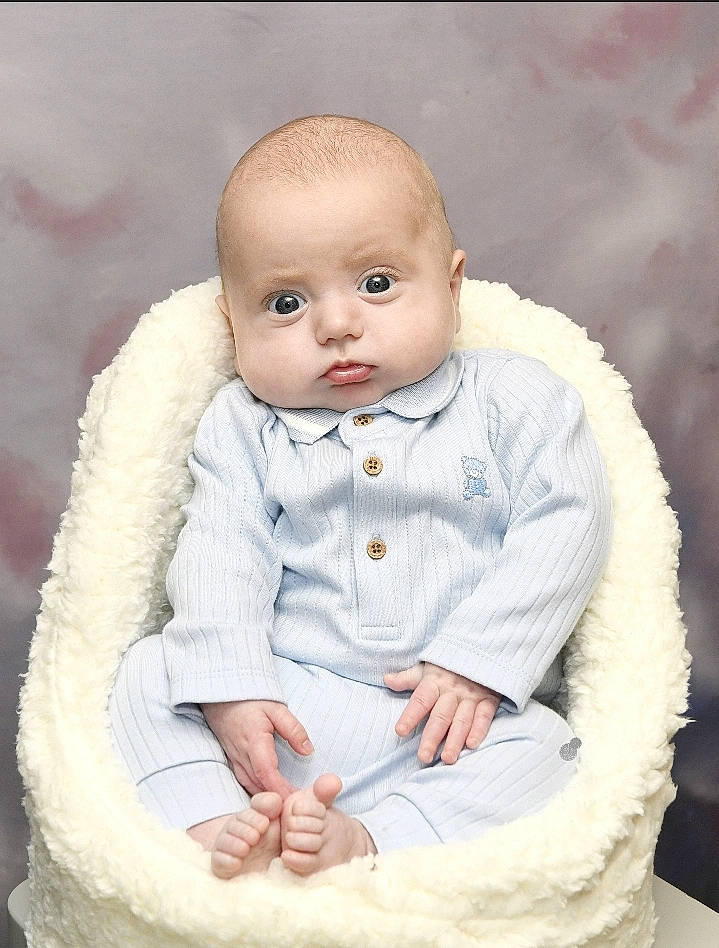 Sonny joined the competition — help win amazing prizes! baby, baby_toddler_clothing, cheek, chin, collar, eye, face, facial_expression, gesture, head, headgear, jacket, lip, nose, outerwear, person, skin, sleeve, standing, toy