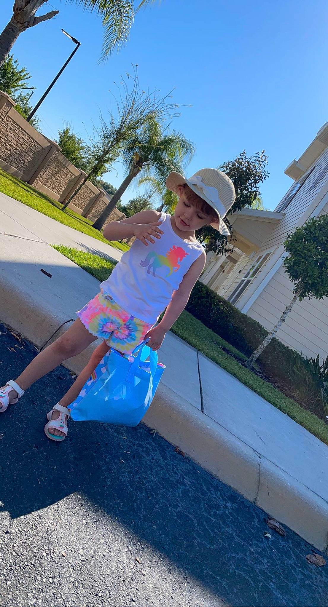 Aubriella is registered to the contest to win money with this photo: asphalt, baseball_cap, cap, city, cowboy_hat, electric_blue, fedora, fun, grass, hat, headwear, leisure, magenta, person, plant, recreation, road_surface, sidewalk, sky, sun_hat