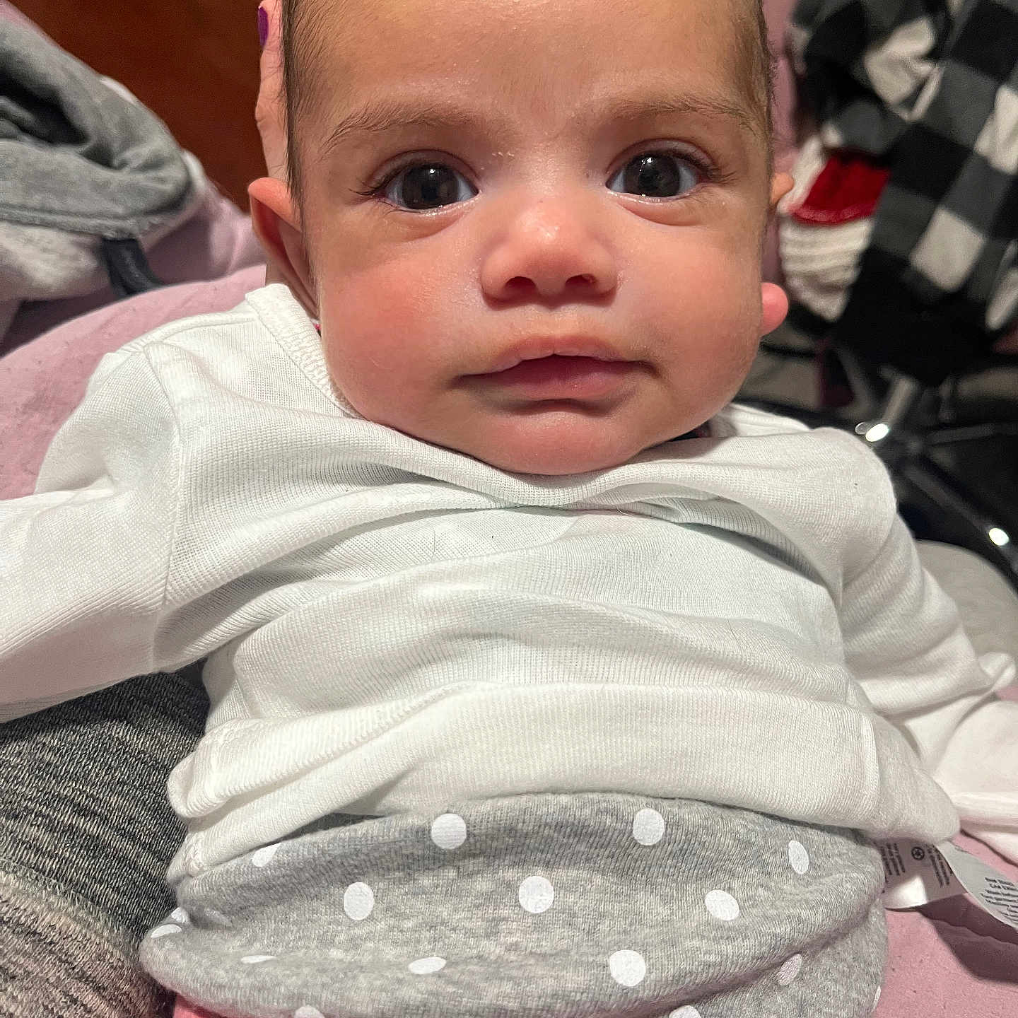 Liana joined the competition — help win amazing prizes! baby, bodypart, clothing, couch, face, finger, frown, furniture, hand, head, knitwear, newborn, pants, pattern, person, photography, portrait, sad, sitting, t_shirt