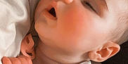 Kaylem is registered to the contest to win money with this photo: baby, sleeping, infant, person, hand, arm, clothing, soft, closeup, face, skin, peaceful, rest, cute, child, toddler, comfort, nap, young, holding